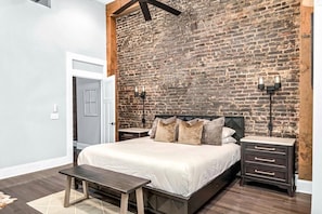Master bedroom suite includes a king bed. full bathroom and walk in closet