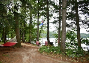 2019 Photo of Lakeside Deck Furniture and Hammock.  Overlooking Swimming Raft.  