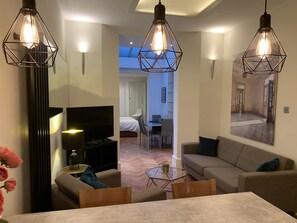 Open plan lounge and kitchen showing dining area