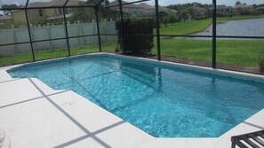 Private screened in pool with lake view