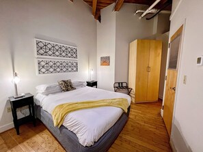 Master bedroom with queen bed includes a full bathroom and is located just off of the entrance to the loft.