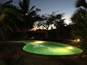 Lighted Pool at sundown. Has 2 whirlpools.