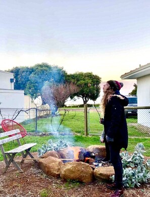 The cooler evenings are for lighting up the fire pit and toasting marshmallows 