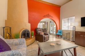 The living room includes a recliner for relaxing and super comfortable leather.