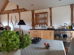 Cooking is a pleasure in the characterful, well equipped kitchen