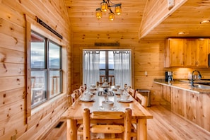 Open dinning room with great views looking out onto the mountains.