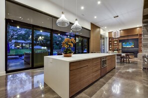 Kitchen - Kitchen area opens into the spacious dining and living area