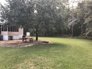 Backyard is perfect for children playing or spreading a blanket for star gazing.