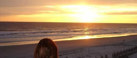 Enjoying my favorite time of the day at the beach on the balcony