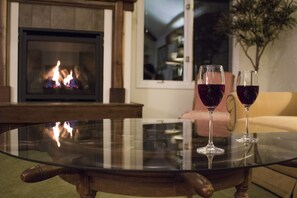 Living room fireplace promises fine memories--relaxation, stories, romance?