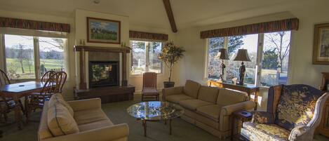 Gas fireplace in living room adds cozy warmth on winter days! 