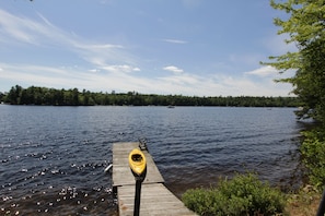 The dock with one of the 3 kayaks on the property