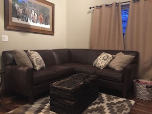 New (2018) sectional and ottomans for comfy seating.