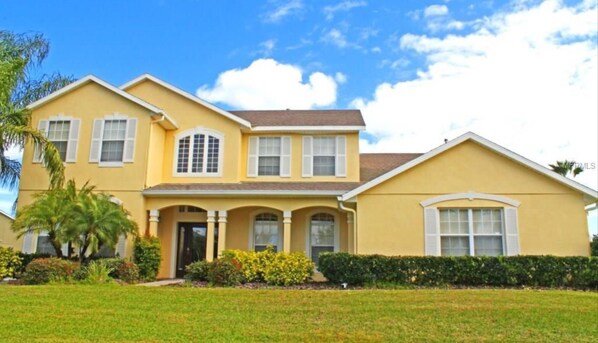 Big yellow house on 0.55  acre