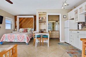 Bed, Dining Area, and Bathroom