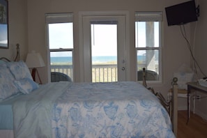 Master bedroom with spectacular ocean views, deck access (3rd floor)