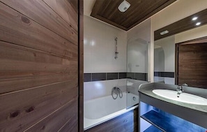 Prepare for the day in the spacious bathroom