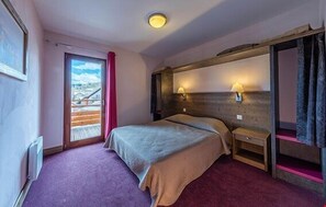 Drift off to sleep in the large master bedroom on the plush double bed