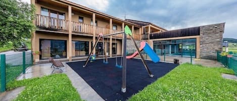 Perfect for families, your little ones will enjoy playing on the playground and running around in the grass