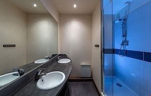 Prepare for the day in the spacious bathroom