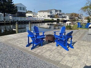 Adirondack Chairs on the Patio with fire pit