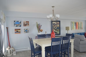 Dining Area - expandable table to seat 8.  Counter height to see the ocean!