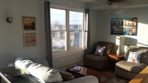 Living room conversation area with afternoon sun