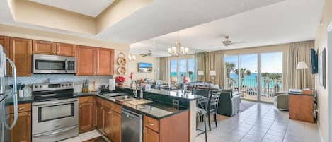 Looking From Kitchen, dining area, and Family Room Beautiful View Of The Gulf