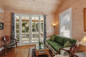 The beach cottage living area is full of natural light.