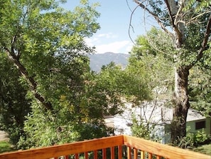 View of Pikes Peak from deck off the Living Room. Seating for 6.