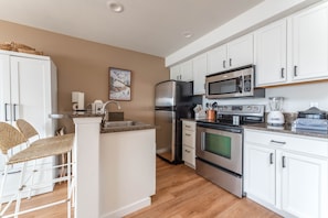Beautifully updated kitchen that makes you want to stay in and cook