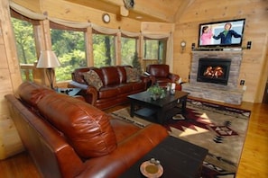 Enjoy a Fire While Relaxing in the Rich Leather Décor! 50' Plasma TV!!!