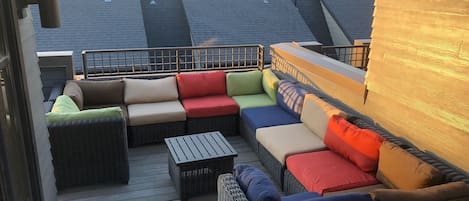 Private roof top deep seating area to relax and unwind