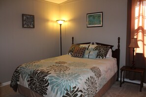 Warm and cozy master bedroom with Queen bed.