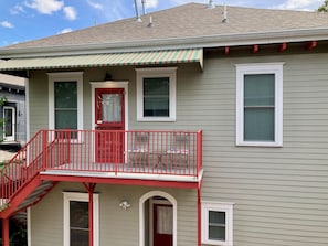 Hopkins House 2nd floor apartment private entry is off rear awning covered deck