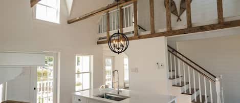 Kitchen with original beams, with relaxing views of the bay, and nature