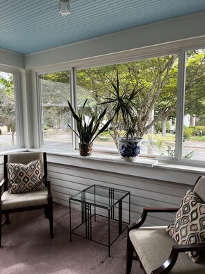 Enclosed porch for morning coffee or birdwatching