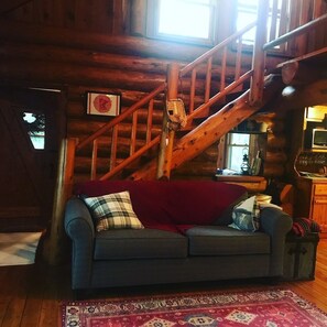 Great room/stairs to loft. Couch folds out to queen sized bed. 