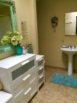 Bathroom has shower AND large bathtub