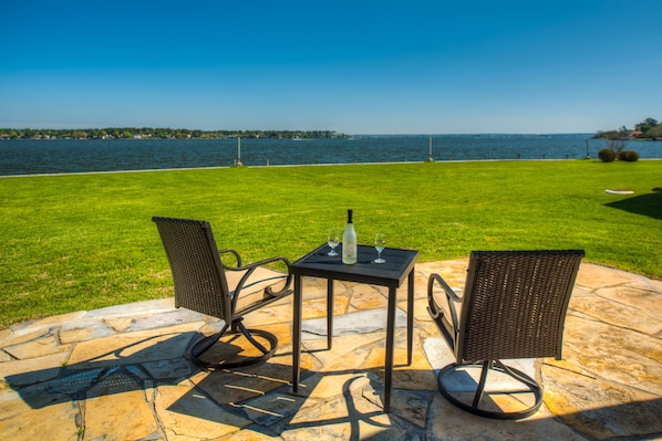 Relax and enjoy this beautiful view of the open waters from the extended patio.