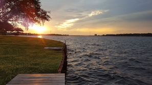 A view of the sunset on Lake Conroe steps away from the condo on the boardwalk.