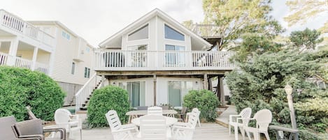 View from the canal. The decks and sunroom are south-facing.  