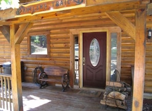 Front Deck...Check Out the Wheelbarrow Bench and Complimentary Fire Wood!