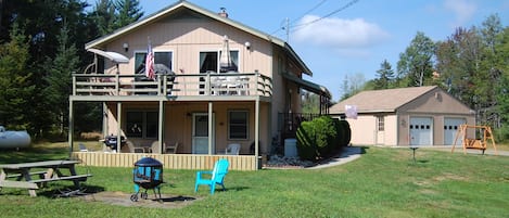 Beautiful home on 3 acres of privacy, front deck and patio