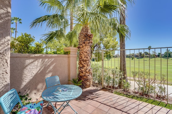 Living room patio overlooking golf course and Greenbelt bike path.