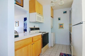 Kitchen with washer and dryer