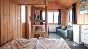 Each cottage has one bunk bed and one sofa bed