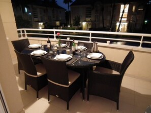 Alfresco Dining on balcony over looking pools & gardens