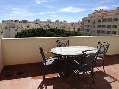 Attic excellent location. Wifi Large terrace and pool in summer