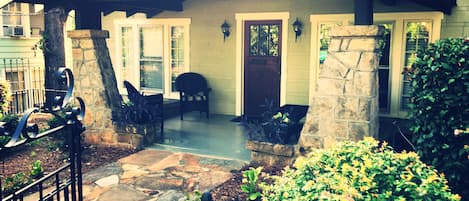 Gated entrance way to front porch